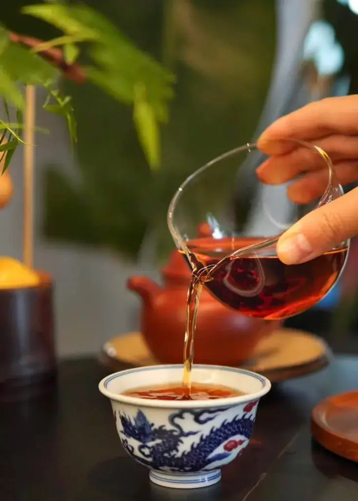 Enjoying alone time with a handmade porcelain teacup - Serene tea moment