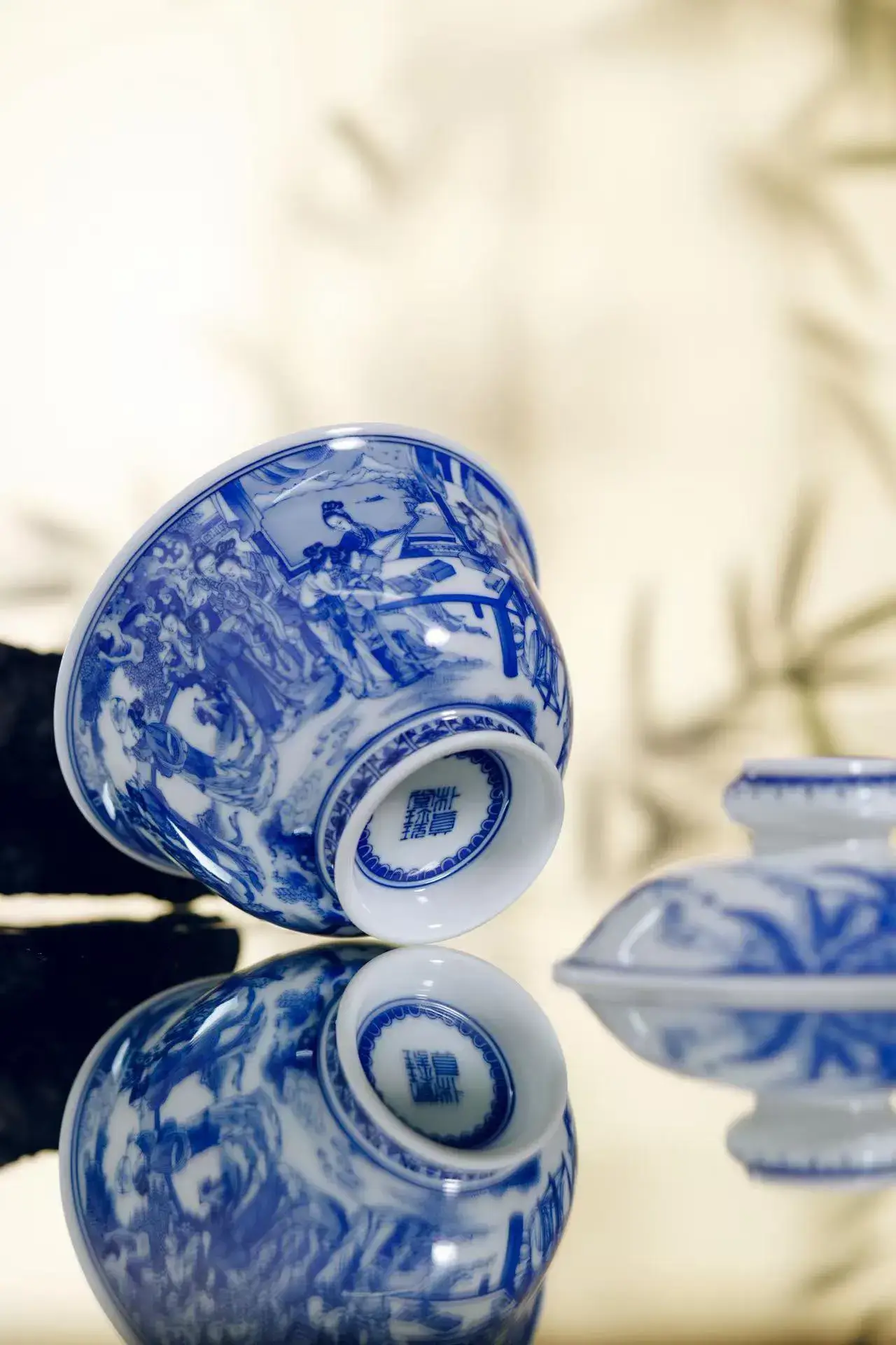 Handmade Porcelain Tea Moments - Close-up of hand-painted blue and white teacup
